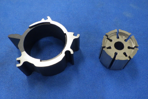 Development of parts for variable capacity oil pumps:Cam ring (left) and vane rotor (right)