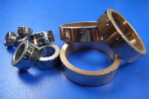 A manufacturing method of  sintered bearings suitable for resin insert